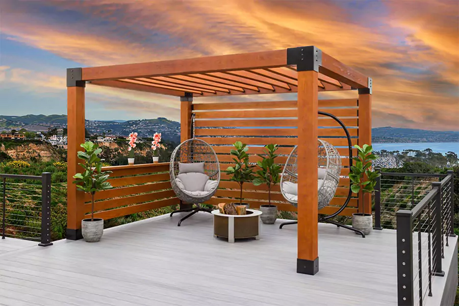 Elegant wooden pergola design with modern seating and stunning sunset views, built for relaxing outdoor spaces. Highlighting expert craftsmanship for outdoor projects in Plano, TX.