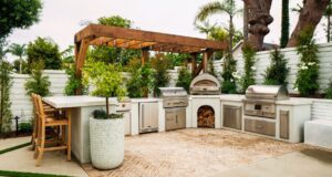 Stylish low-maintenance outdoor kitchen with stainless steel appliances and durable flooring—best materials for easy-care outdoor kitchens in Frisco, TX.